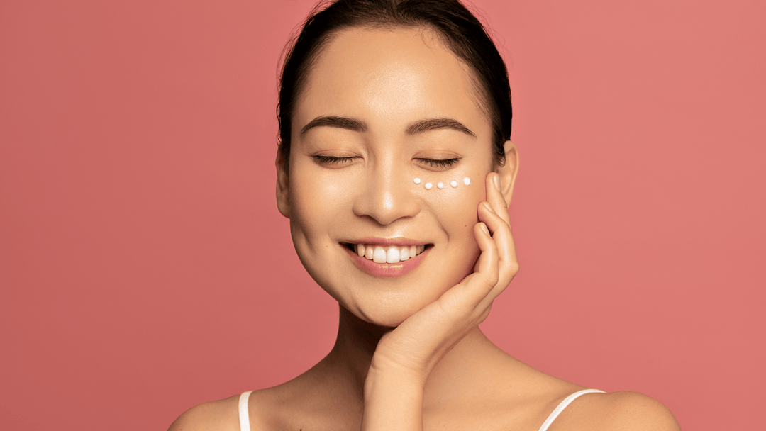 Woman_applying_organic_eye_cream